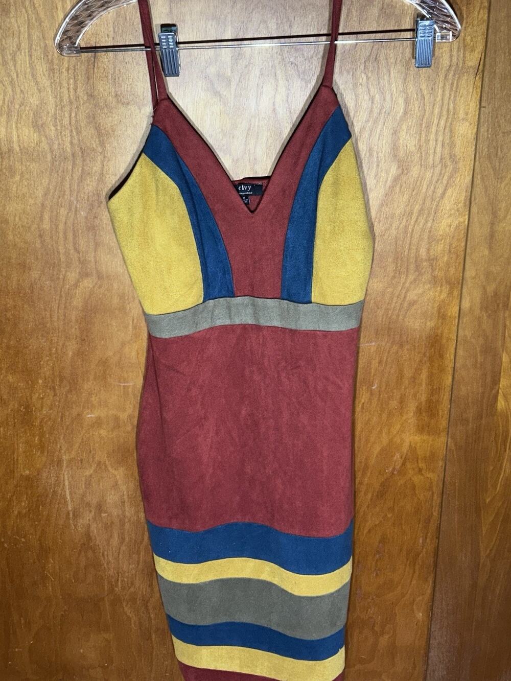 Privy branded faux suede dress features a colorful striped pattern